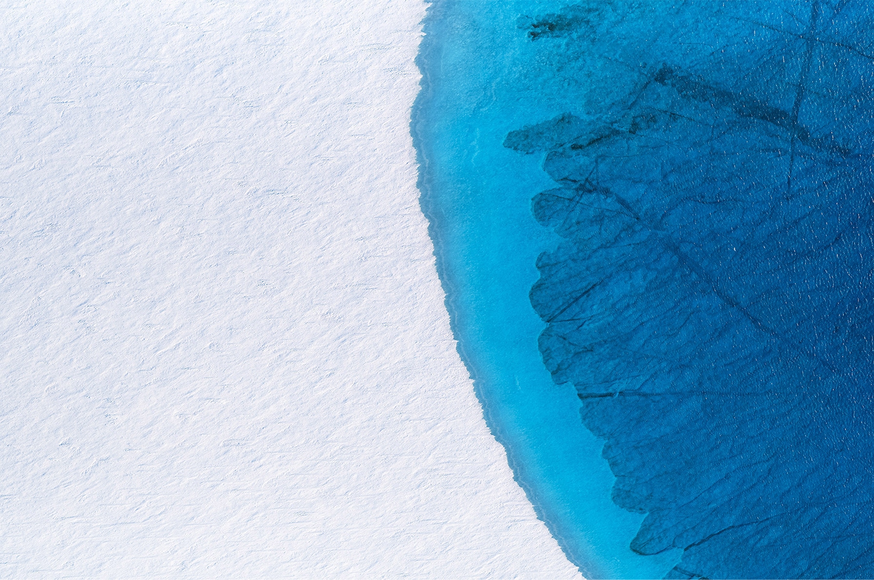 Aerial Greenland ice edge, right homepage panel.